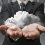 businessman-holding-cloud-in-hands_fyiRFKH_-min